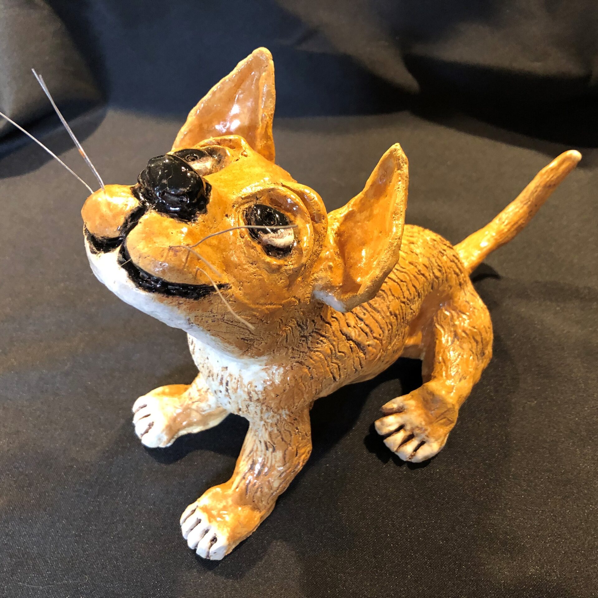 ceramic sculpture of a rescue dog